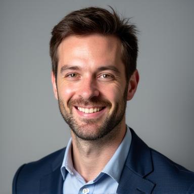 A professional headshot of Alex Mercer, founder of Lumina Lens